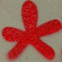 Graffiti du Canal St Denis avec tag étoile pentagonale